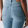 Denim Forum Le jean slim bootcut taille haute Nina des années 90