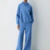 Pantalon de survêtement à larges bandes en molleton douillet