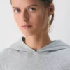 Sweat à capuche en coton côtelé extensible