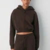 Sweat-shirt à capuche zippé court en molleton douillet